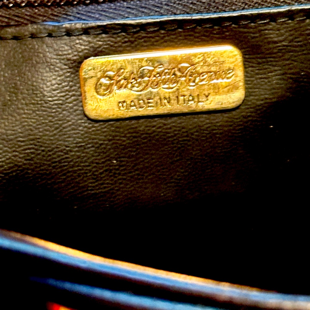 Saks Fifth Avenue black leather purse.